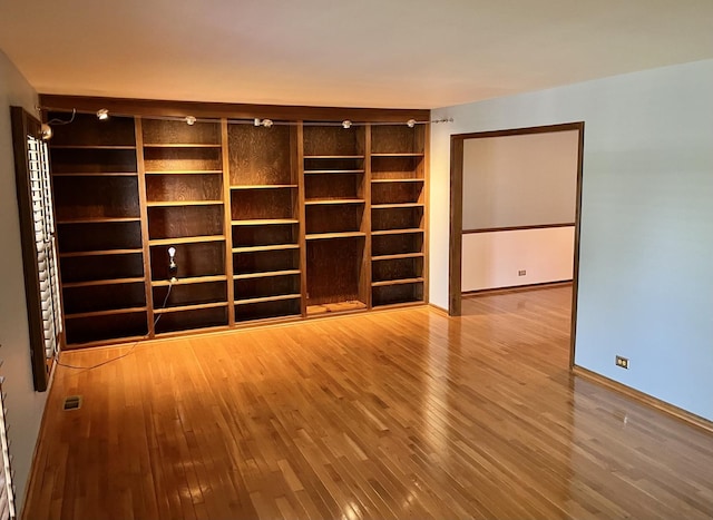 3485 Ronald Rd, Crete, IL 60417 - spare room featuring wood-type flooring and baseboards