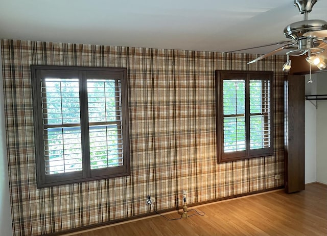 3485 Ronald Rd, Crete, IL 60417 - spare room featuring a ceiling fan, wood finished floors, and wallpapered walls