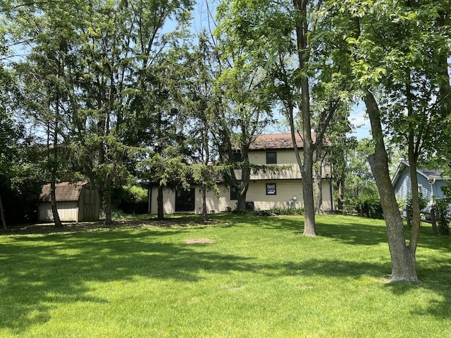 3485 Ronald Rd, Crete, IL 60417 - view of green lawn featuring a storage shed