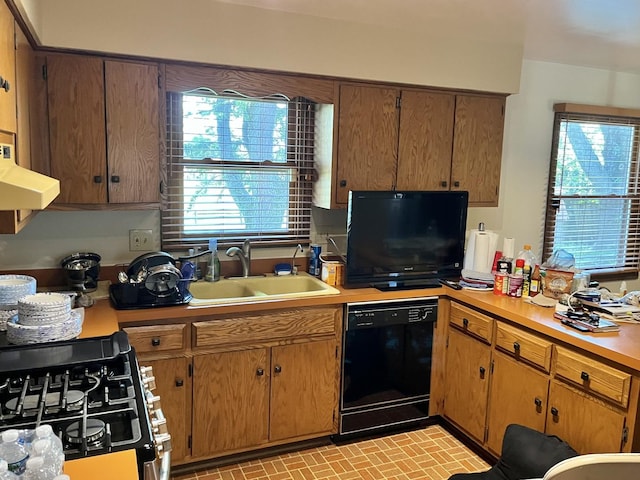 3485 Ronald Rd, Crete, IL 60417 - kitchen featuring black dishwasher, gas range oven, light countertops, and exhaust hood