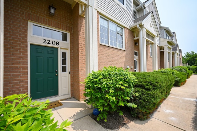 2208 W Concord Ln, Addison, IL 60101 - doorway to property with brick siding