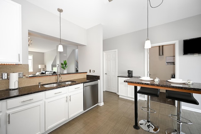 2208 W Concord Ln, Addison, IL 60101 - kitchen featuring dishwasher, white cabinetry, tasteful backsplash, and pendant lighting