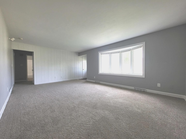 1718 Gilboa Ave, Zion, IL 60099 - carpeted spare room featuring baseboards
