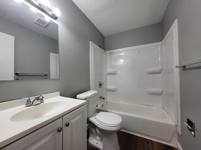 1718 Gilboa Ave, Zion, IL 60099 - full bath with wood finished floors, vanity, and washtub / shower combination