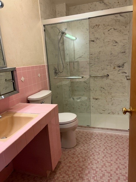 8801 Robin Dr Unit C, Des Plaines, IL 60016 - full bathroom with vanity, a stall shower, tile patterned floors, and tile walls