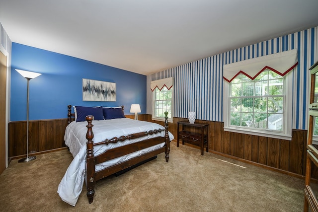 116 W Bailey Rd, Naperville, IL 60565 - carpeted bedroom with a wainscoted wall, wooden walls, and wallpapered walls