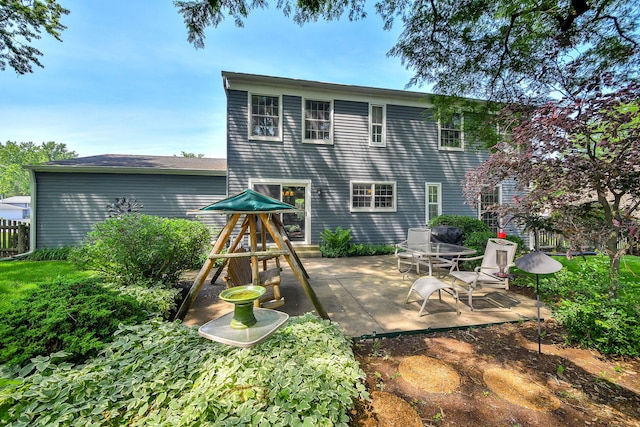 116 W Bailey Rd, Naperville, IL 60565 - rear view of house featuring a patio