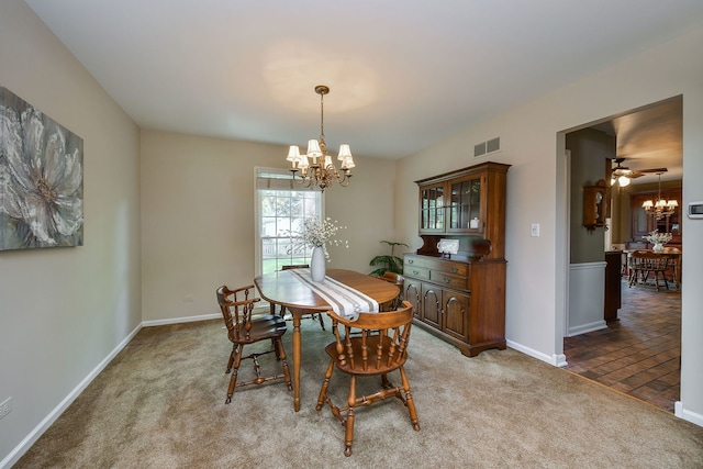116 W Bailey Rd, Naperville, IL 60565 - dining space with a chandelier and light carpet