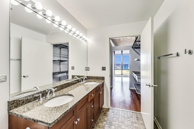 1525 S Sangamon St Unit 609, Chicago, IL 60608 - bathroom with double vanity and baseboards
