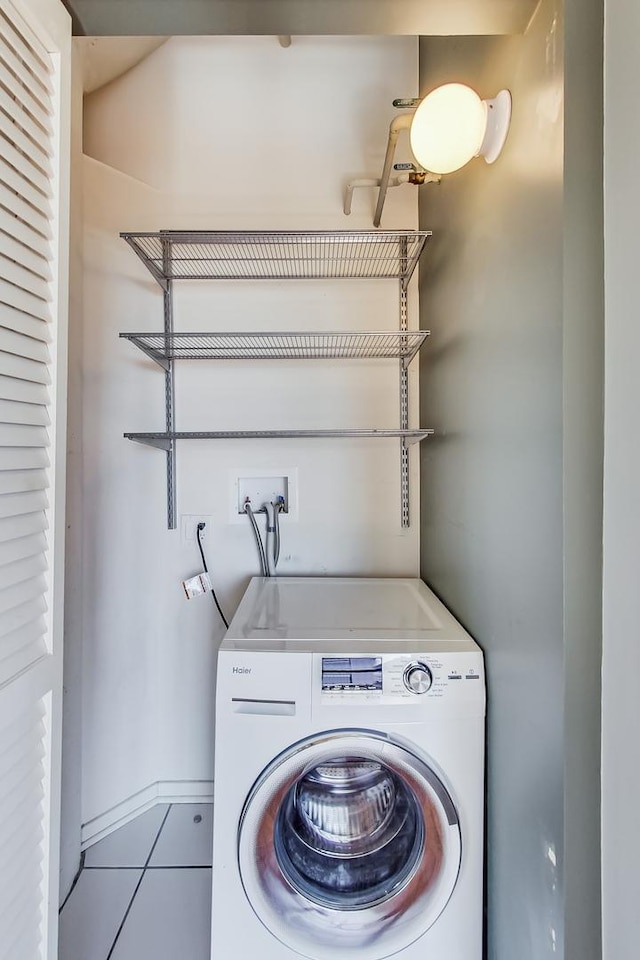 1525 S Sangamon St Unit 609, Chicago, IL 60608 - laundry room featuring washer / clothes dryer and tile patterned flooring