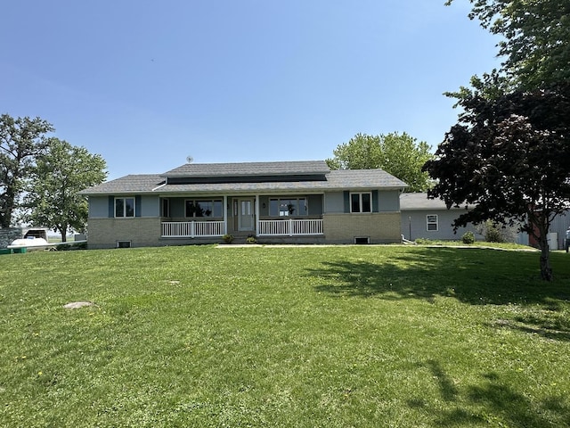 80 Smit Rd, Prophetstown, IL 61277 - view of front of property with a porch, a front yard, and brick siding