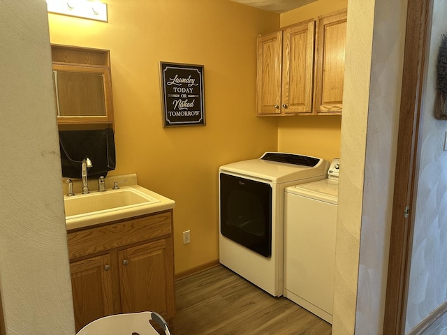 80 Smit Rd, Prophetstown, IL 61277 - laundry area with washer and dryer, wood finished floors, and cabinet space