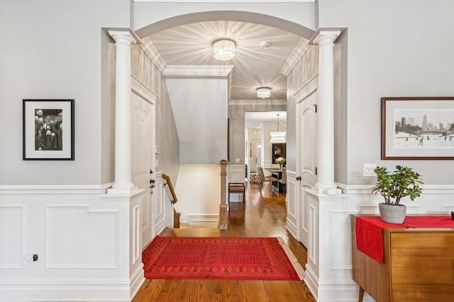 1430 W Diversey Pkwy Unit 1, Chicago, IL 60614 - foyer with a decorative wall, wood finished floors, ornamental molding, arched walkways, and a wainscoted wall