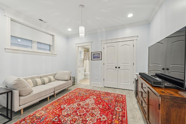 1430 W Diversey Pkwy Unit 1, Chicago, IL 60614 - living area with light wood-style floors, ornamental molding, and recessed lighting