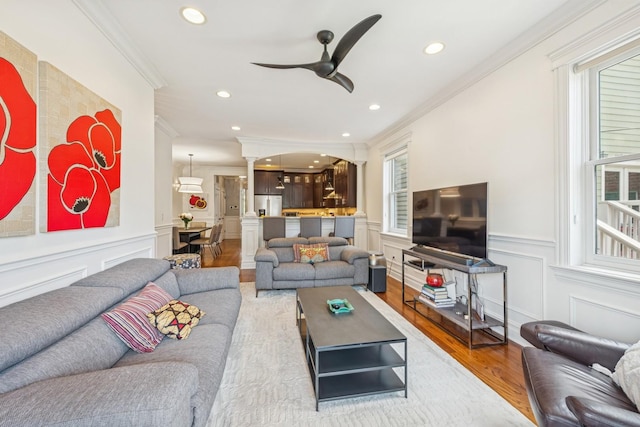 1430 W Diversey Pkwy Unit 1, Chicago, IL 60614 - living area with ornamental molding, wood finished floors, a ceiling fan, recessed lighting, and a decorative wall