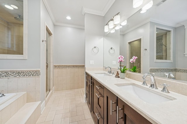 1430 W Diversey Pkwy Unit 1, Chicago, IL 60614 - bathroom featuring a shower stall, a garden tub, double vanity, crown molding, and recessed lighting