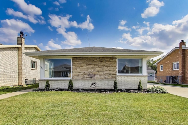 8433 W Betty Ter W, Niles, IL 60714 - view of side of property with a yard and brick siding