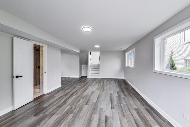 8433 W Betty Ter W, Niles, IL 60714 - below grade area with stairway and dark wood-style floors