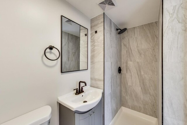 8433 W Betty Ter W, Niles, IL 60714 - bathroom featuring vanity and tiled shower