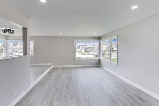 8433 W Betty Ter W, Niles, IL 60714 - unfurnished room featuring light wood-style floors and recessed lighting