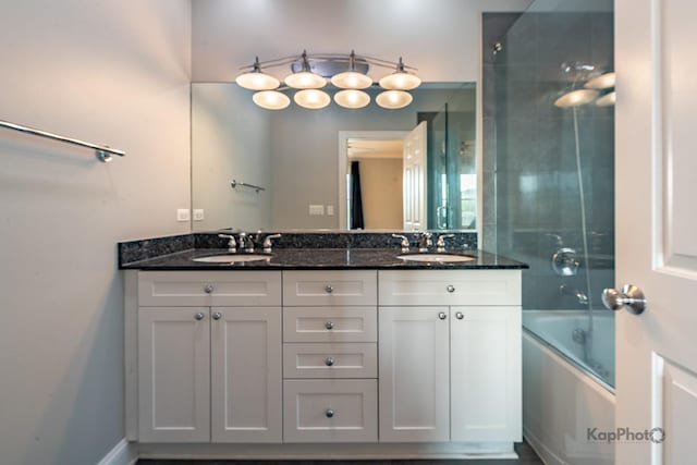 3454 N Ashland Ave Unit 4S, Chicago, IL 60657 - bathroom featuring double vanity and washtub / shower combination