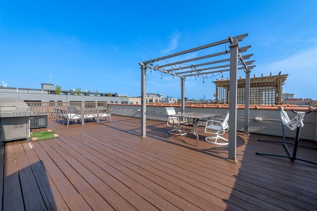 3454 N Ashland Ave Unit 4S, Chicago, IL 60657 - wooden terrace featuring a pergola and a grill