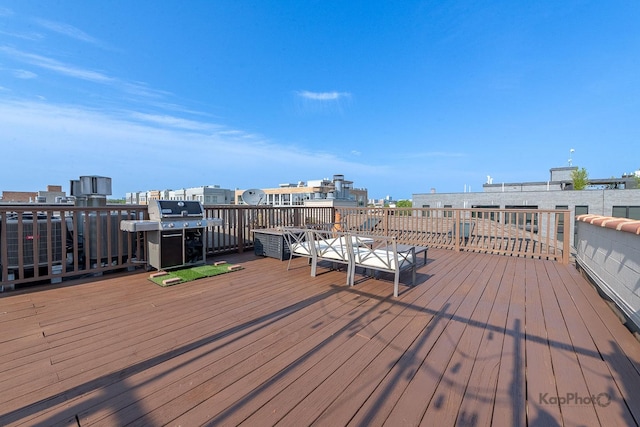 3454 N Ashland Ave Unit 4S, Chicago, IL 60657 - wooden terrace with a grill