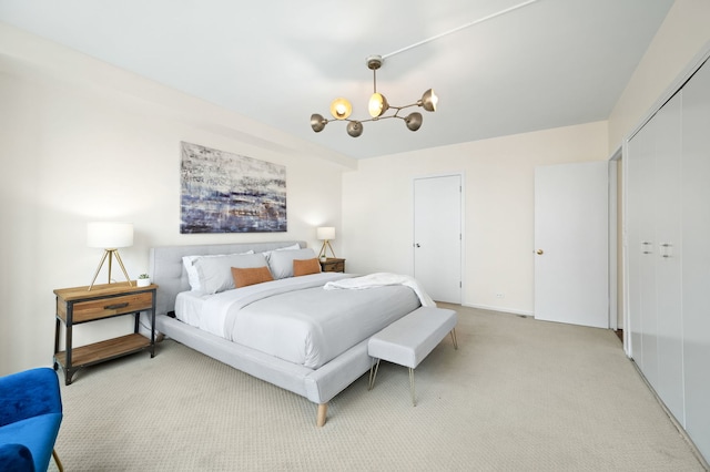 3180 N Lake Shore Dr Unit 8A, Chicago, IL 60657 - bedroom with a chandelier and light colored carpet