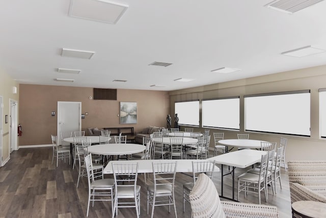 1400 N Elmhurst Rd Unit 310, Mount Prospect, IL 60056 - dining area with dark wood finished floors and baseboards