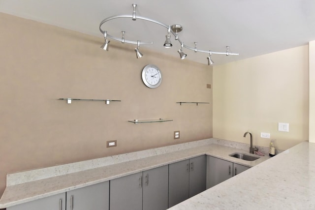 1400 N Elmhurst Rd Unit 310, Mount Prospect, IL 60056 - kitchen with gray cabinets and light stone counters