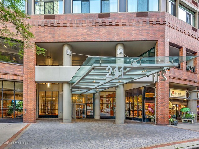 211 E Ohio St Unit 2707, Chicago, IL 60611 - entrance to property with brick siding and a balcony