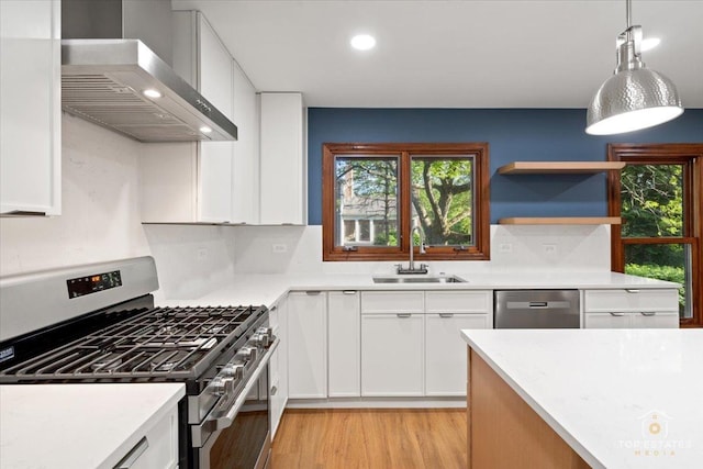 21824 Cambridge Dr, Kildeer, IL 60047 - kitchen with stainless steel appliances, wall chimney exhaust hood, white cabinetry, light countertops, and recessed lighting