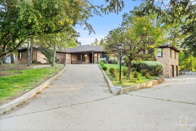21824 Cambridge Dr, Kildeer, IL 60047 - view of front facade with concrete driveway, brick siding, and a garage
