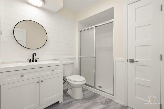 21824 Cambridge Dr, Kildeer, IL 60047 - full bathroom featuring vanity, a shower stall, and wood finished floors
