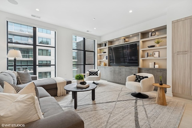 128 S Green St Unit 5Ab, Chicago, IL 60607 - living room featuring light wood-type flooring, recessed lighting, and built in features