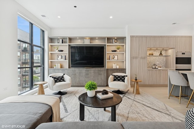 128 S Green St Unit 5Ab, Chicago, IL 60607 - living area with light wood-style floors