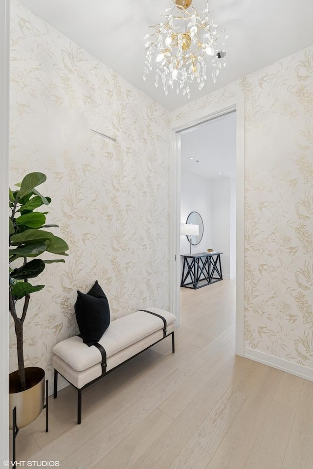 128 S Green St Unit 5Ab, Chicago, IL 60607 - sitting room featuring light wood-style flooring, a chandelier, and wallpapered walls