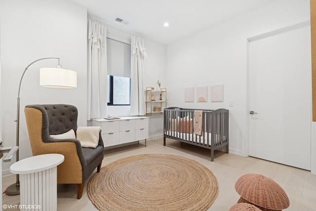 128 S Green St Unit 5Ab, Chicago, IL 60607 - bedroom with a crib and recessed lighting
