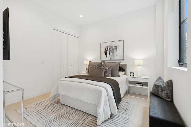 128 S Green St Unit 5Ab, Chicago, IL 60607 - bedroom with a closet, wood finished floors, and recessed lighting
