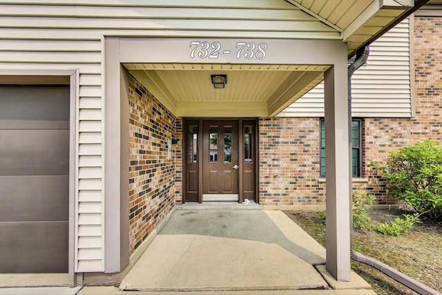 738 Hapsfield Ln Unit 7A2, Buffalo Grove, IL 60089 - entrance to property with brick siding and an attached garage