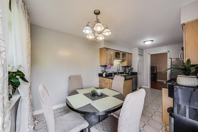 738 Hapsfield Ln Unit 7A2, Buffalo Grove, IL 60089 - dining space featuring a chandelier and baseboards