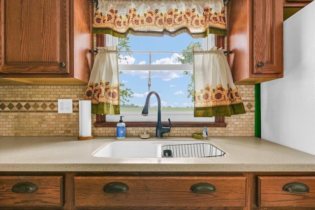 9101 US Highway 36, Metcalf, IL 61940 - kitchen with brown cabinets and backsplash