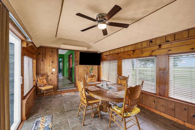 9101 US Highway 36, Metcalf, IL 61940 - dining space featuring wood walls, lofted ceiling, and ceiling fan