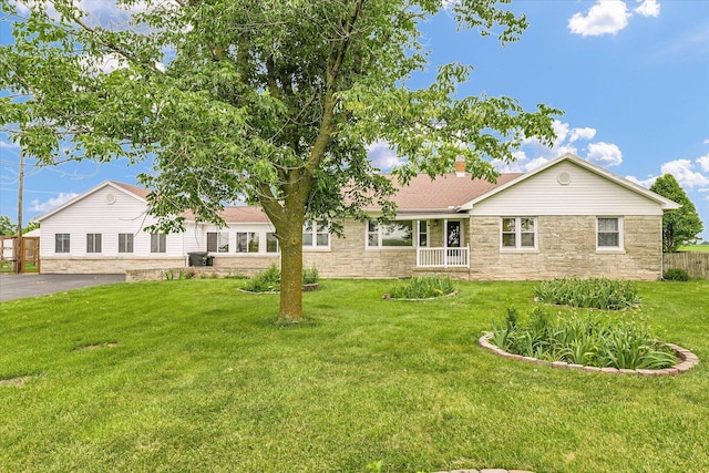 9101 US Highway 36, Metcalf, IL 61940 - view of front facade featuring stone siding, a front lawn, and a chimney