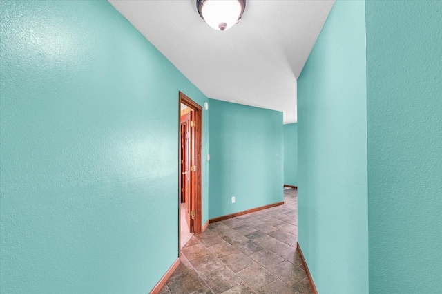 9101 US Highway 36, Metcalf, IL 61940 - hallway with stone finish floors and a textured wall