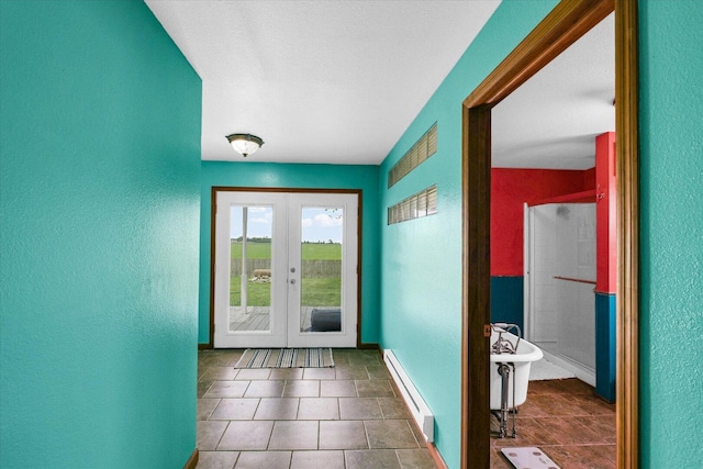 9101 US Highway 36, Metcalf, IL 61940 - entryway featuring a textured wall, french doors, a baseboard radiator, and tile patterned floors