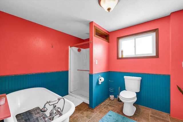 9101 US Highway 36, Metcalf, IL 61940 - full bathroom featuring a wainscoted wall, a stall shower, and a soaking tub