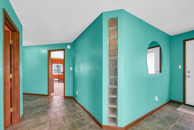 9101 US Highway 36, Metcalf, IL 61940 - hallway with baseboards and stone finish flooring