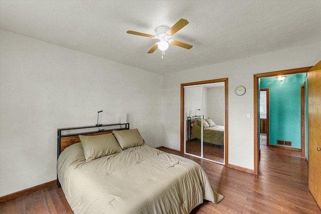 9101 US Highway 36, Metcalf, IL 61940 - bedroom featuring wood finished floors and a ceiling fan
