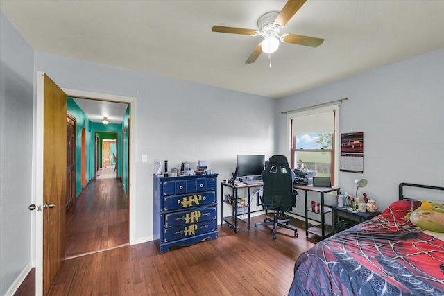 9101 US Highway 36, Metcalf, IL 61940 - bedroom featuring wood finished floors, a desk, and a ceiling fan